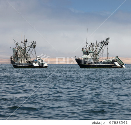 fishing boats in the bay of the Pacific Ocean fishing boats in the bay of the Pacific Ocean 67688541
