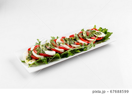 Side view on isolated classic caprese salad  67688599