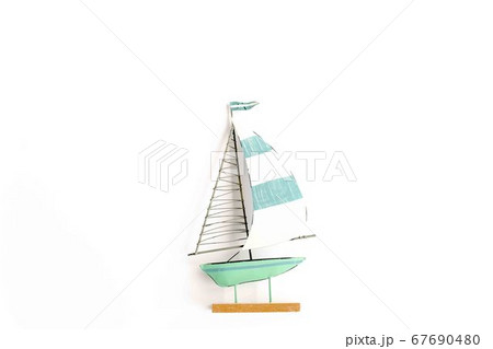 Miniature toy boat on white background. Flat lay, top view 67690480
