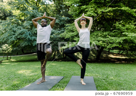 Yoga in Pair. Couple Women. Duo Pose Stock Photo - Image of nature, couple:  63662610