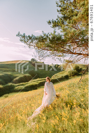 woman white dress wings meadow runs freedom 67691401