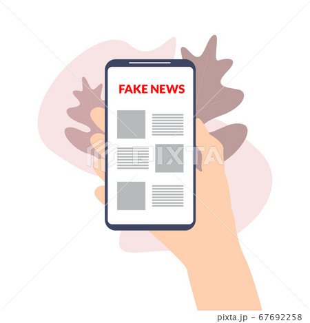 Hand holding phone with fake news concept 67692258
