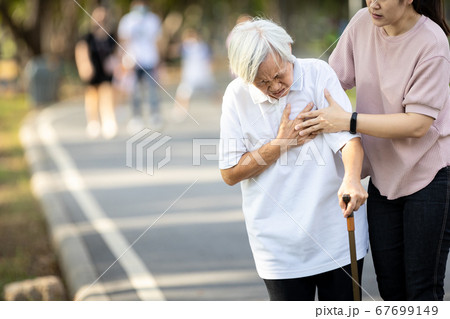 Old elderly with short of breath and chest pain from heart disease, heart attack,holding her hand in the chest,asian senior woman with illness,symptoms of dyspnea,angina,health care,medical emergency Old elderly with short of breath and chest pain from heart disease, heart attack,holding her hand in the chest,asian senior woman with illness,symptoms of dyspnea,angina,health care,medical emergency 67699149