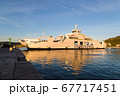 Reflections of the local car ferry 67717451