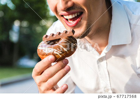 close up view of handsome caucasian young man in close up view of handsome caucasian young man in 67717568