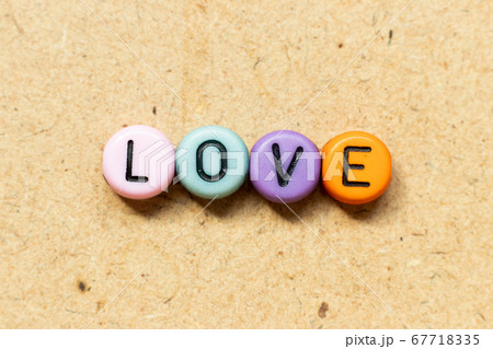 Round color bead with black letter in word love Round color bead with black letter in word love 67718335