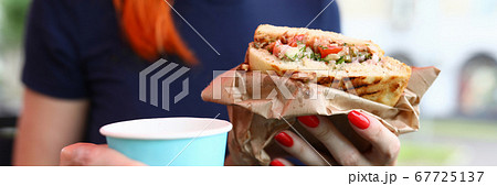 Lady with nice red manicure 67725137