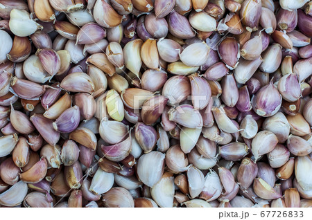 Abstract full flame garlic pile and onion pile for 67726833