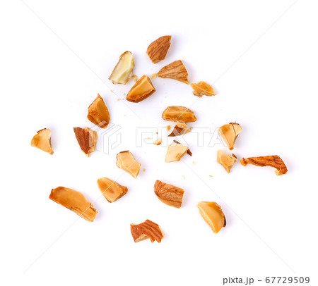 Pieces of almonds on white background 67729509