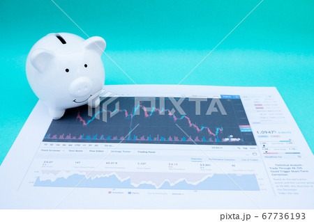 White color piggy bank on share document analyze the plans regarding the stock business investment White color piggy bank on share document analyze the plans regarding the stock business investment 67736193