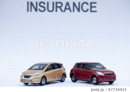 Car placed on insurance documents. Car insurance concept Car placed on insurance documents. Car insurance concept 67736925