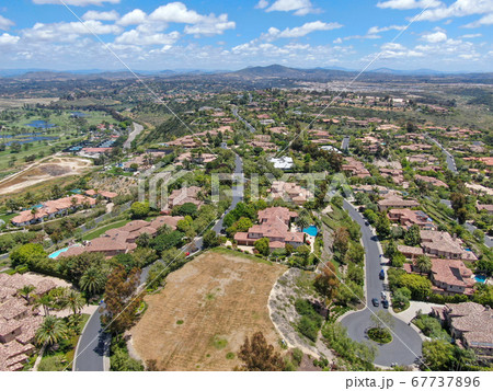 Aerial view of high class neighborhood with big villa in the valley, San Diego 67737896