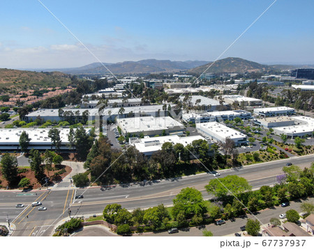 Aerial view to industrial zone and company office, storage warehouse, California 67737937