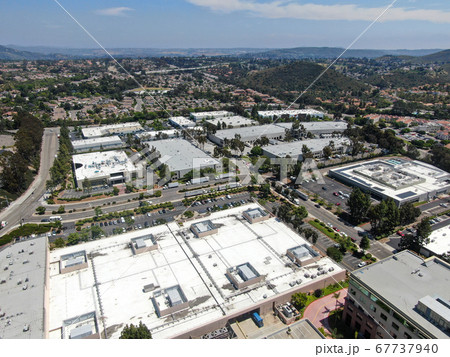 Aerial view to industrial zone and company office, storage warehouse, California 67737940