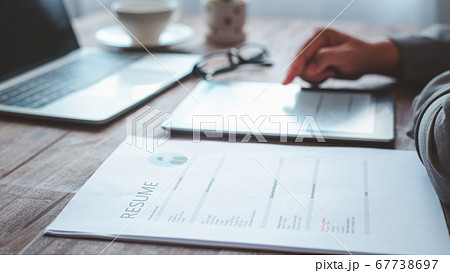 People are filling out their personal resume on People are filling out their personal resume on 67738697