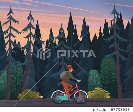 A cyclist rides a bicycle through a dark, thick forest. Sports and recreation, active lifestyle A cyclist rides a bicycle through a dark, thick forest. Sports and recreation, active lifestyle 67738938