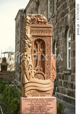 .Stone cross near the church of St. Mesrop Mashtots in memory of the genocide in the village of Oshakan 67741650