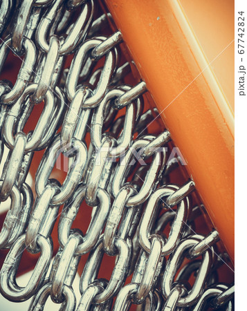 Detailed closeup, lot of silver chains 67742824