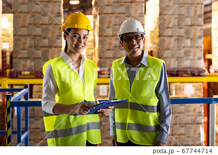 Portrait of asian warehouse manager and worker 67744714