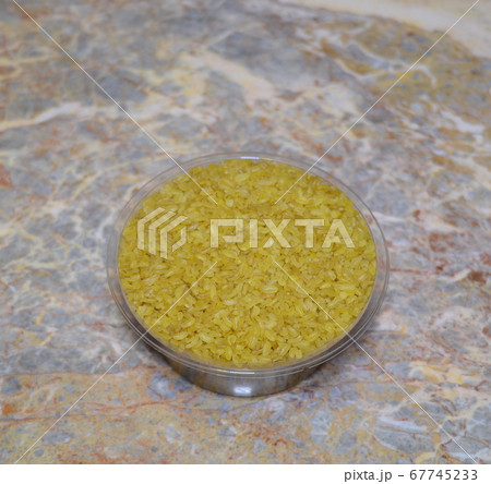 hot yellow bulgur for hot cooking - a useful food 67745233