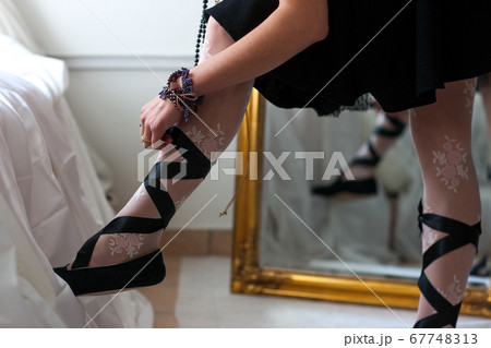 Trying on clothes for the party tonight 67748313