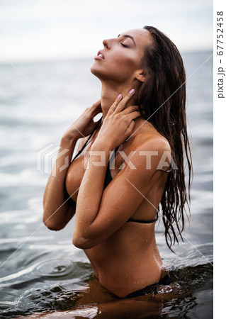 Summertime recreation concept. Beautiful young sexy woman with fit