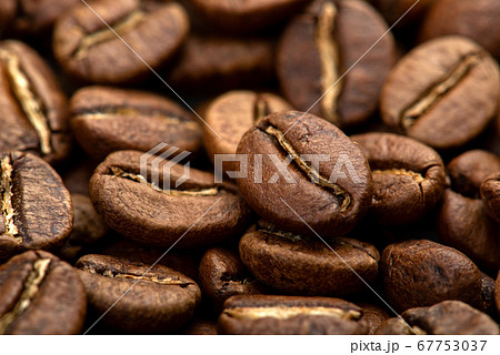 Coffee beans close-up background. Fresh roasted Coffee beans close-up background. Fresh roasted 67753037