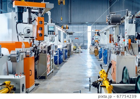 Inside the new factory manufacturing electrical cable. Cable production. Inside the new factory manufacturing electrical cable. Cable production. 67754239