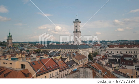 Aerial drone shot of european city Lviv, Ukraine. Flight above popular ancient part of old town 67757334