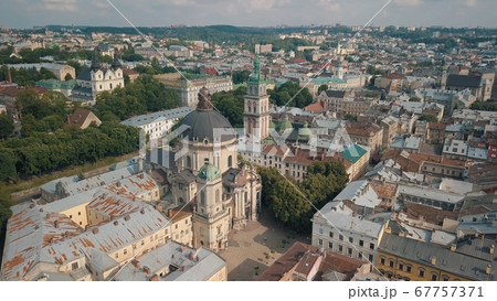 Aerial drone shot of city Lviv, Ukraine. Ancient Ukraine Dominican Church. Panorama of old town 67757371