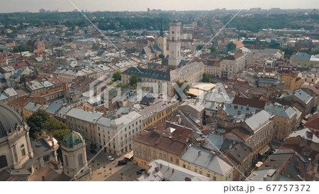 Aerial drone shot of european city Lviv, Ukraine. Rynok Square, Central Town Hall, Dominican Church 67757372