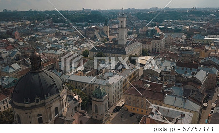 Aerial drone shot of european city Lviv, Ukraine. Rynok Square, Central Town Hall, Dominican Church 67757373