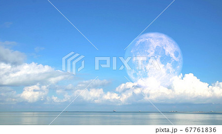 Super full strawberry blood moon and blue sky over 67761836
