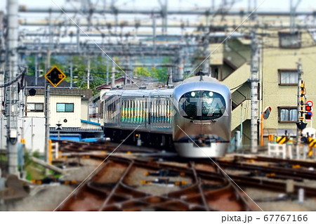 ミニチュアジオラマ風写真 飯能駅に入る西武新型特急ラビューの写真素材