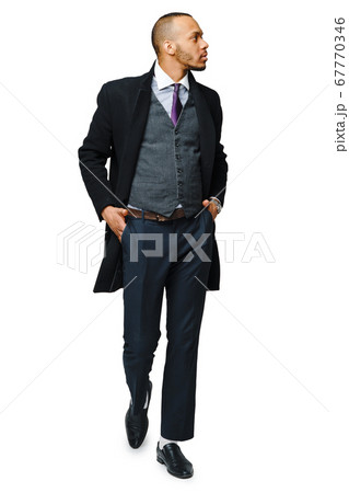 full length studio shot of a african-american businessman wearing coat Isolated on white background 67770346