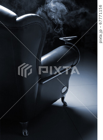 Cigar and beautiful leather armchair on marble to Cigar and beautiful leather armchair on marble to 67771156