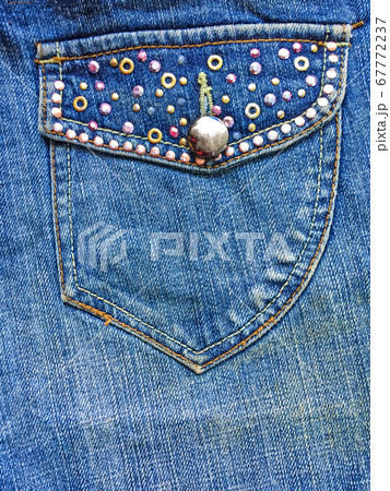 Pocket on jeans fashion denim fabric background Pocket on jeans fashion denim fabric background 67772237