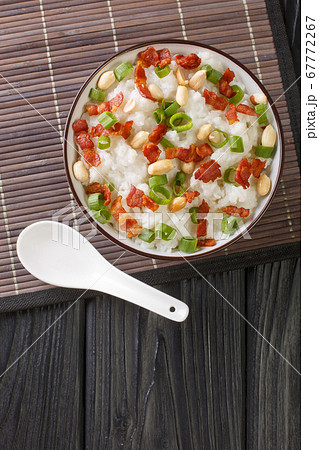 Chinese cooking, congee (jook) boiling rice with a 67772267