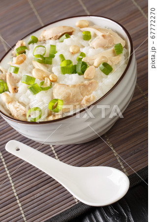 Rice porridge with boiled chicken, peanuts and 67772270