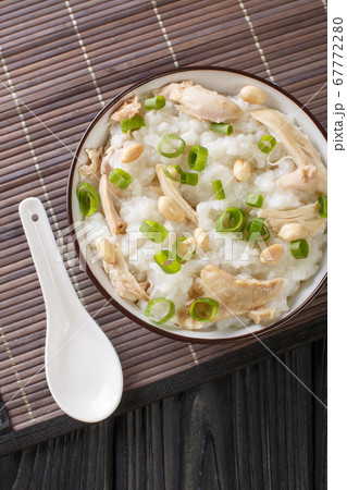 Rice porridge with boiled chicken, peanuts and 67772280