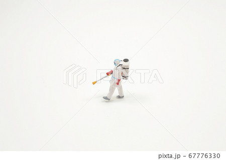 a mini FIGURE COVID 19 on the board. a mini FIGURE COVID 19 on the board. 67776330
