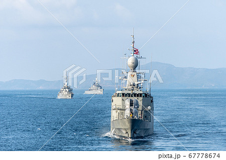 H.T.M.S. Rattanakosin, Royat Thai Navy corvette warship sails in front of anather ships in the fleet 67778674
