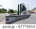 Statuary of  the legenday Korean weapons in the fountain on the footpath in Gimehae, South Gyeongsang province, South Korea. 67779054