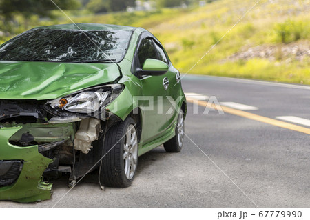 Front of green color car damaged and broken by Front of green color car damaged and broken by 67779990