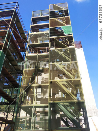SEREMBAN, MALAYSIA -MAY 24, 2020: Temporary access and metal staircase made from staging, scaffolding and metal platform under construction at the construction site.  67785637