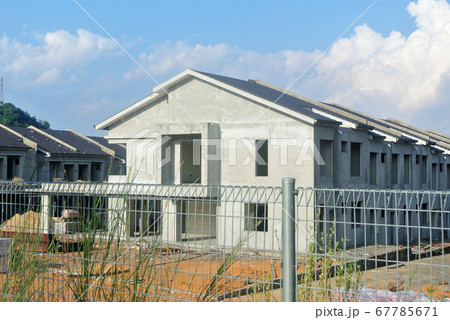 SEREMBAN, MALAYSIA -APRIL 07, 2020: New double story luxury terrace house under construction in Malaysia.  Designed by an architect with a modern and contemporary style.  67785671