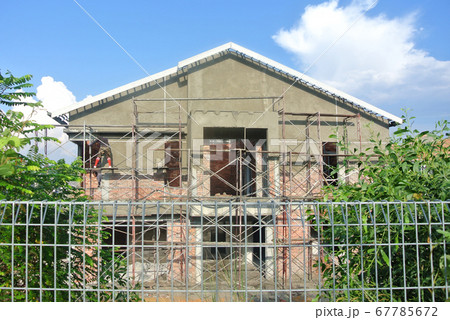 SEREMBAN, MALAYSIA -APRIL 07, 2020: New double story luxury terrace house under construction in Malaysia.  Designed by an architect with a modern and contemporary style.  67785672