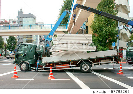 歩道橋で交通事故を起こした大型トラックの写真素材