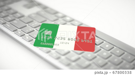 Plastic bank card depicting flag of Italy on computer keyboard. Fictional numbers 67800338