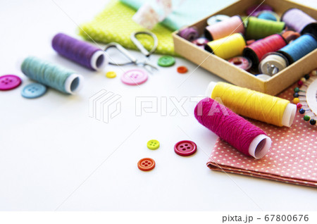 Sewing accessories on a white background Sewing accessories on a white background 67800676